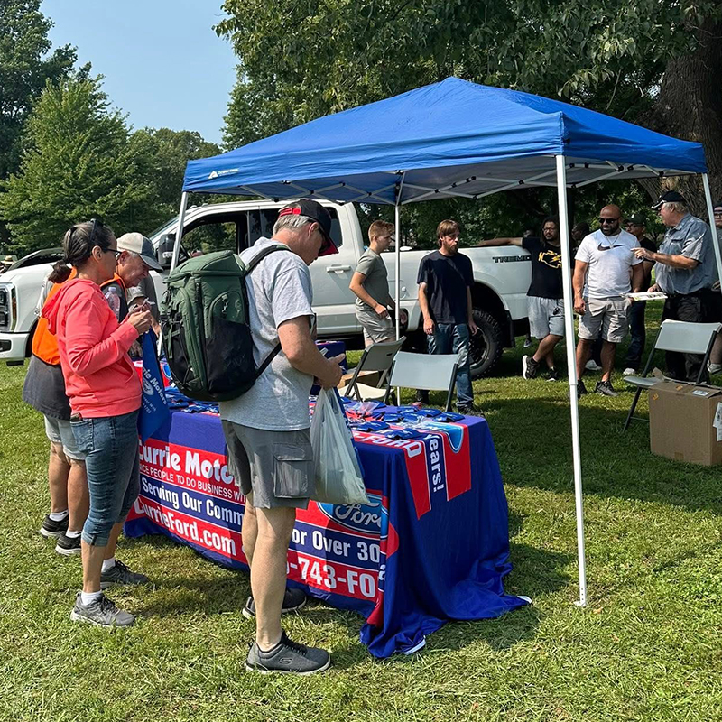 Currie Motors Community Involvement table tailgate